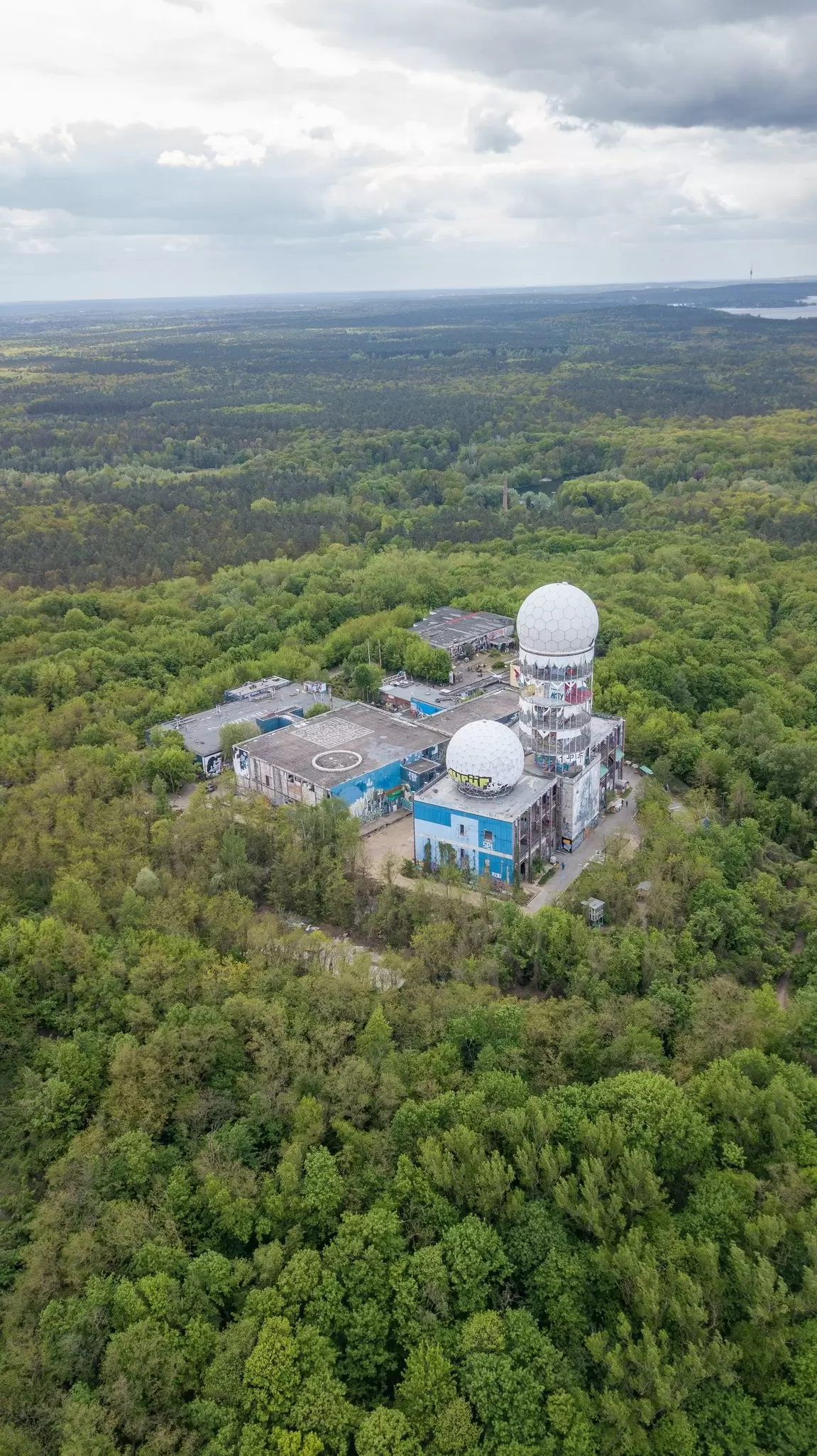 Berlin, Germany - May 3, 2019: Aerial view of Spying station on Teufelsberg (DDR history) in Berlin, Germany, License Type: media, Download Time: 2025-11-05T17:56:56.000Z, User: dorota_littlerobindesign, Editorial: true, purchase_order: 56530 - Guidebooks, job: Global Publishing WIP, client: Berlin 13, other: Dorota Michalec