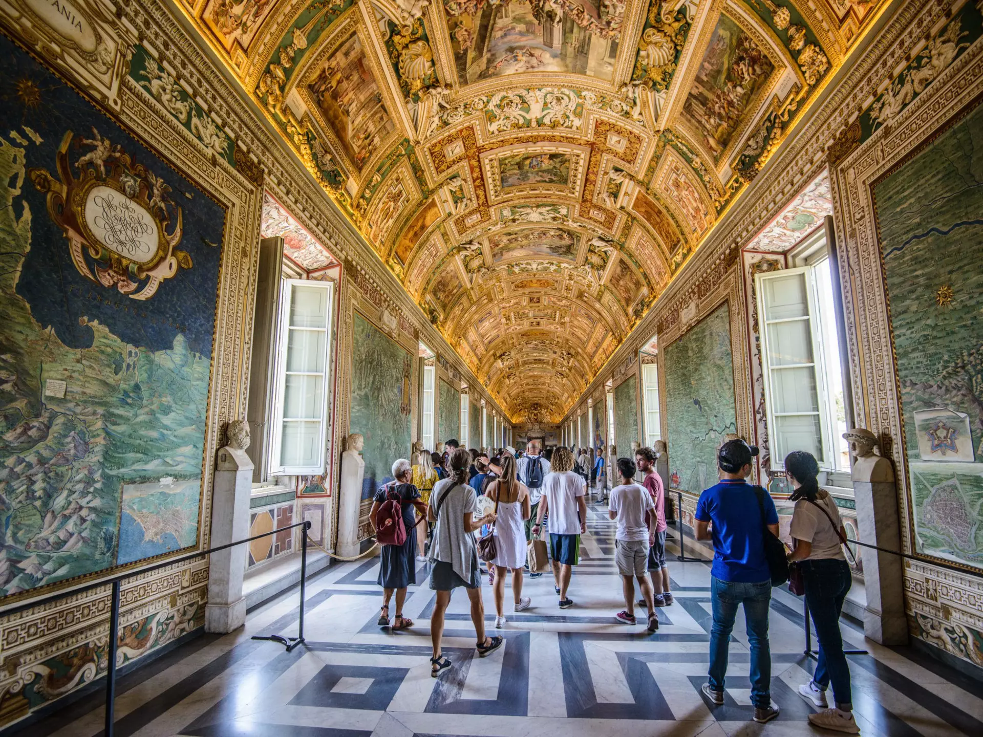 August, 2017: Visitors walk under frescoes in a hallway at the Vatican Museum.
713044405
amazing, ancient, art, artist, artistic, ceiling, city, exhibition, frescoes, gallery, hall, historical, history, indoor, inside, interior, italia, italian, italy, maps, marble, museum, nature, objects, one, people, roma, roman, rome, room, scene, sculpture, sight, spiral, staircase, statue, vatican, vatican-city