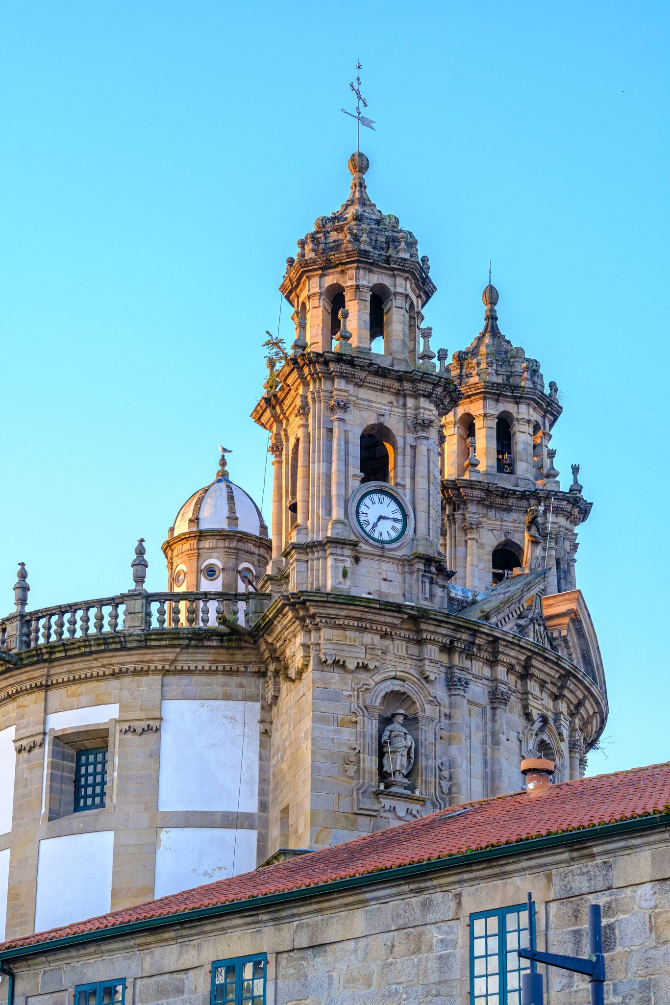 View of the bell tower and facade of the Santuario da Virxe Peregrina in Pontevedra, Spain.
