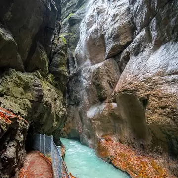 The Partnachklamm Gorge in Bavaria, Germany is a twisty hike through a narrow canyon.