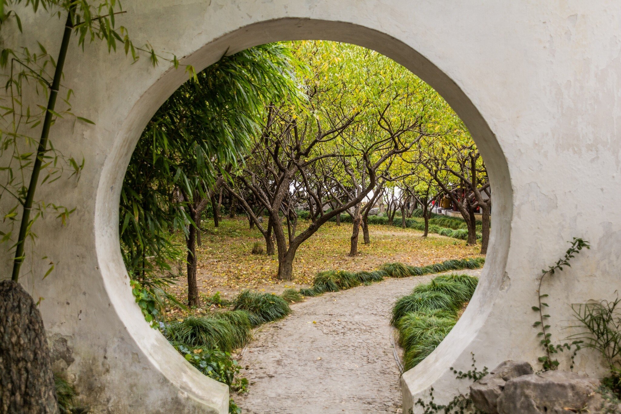 Moon Gate in the Garden of Pleasance (Yiyuan) in Suzhou, Jiangsu province, China, License Type: media, Download Time: 2026-09-01T19:13:49.000Z, User: LP_NZhan, Editorial: false, purchase_order: 65050 - Digital Destinations and Articles, job: App Content, client: Lonely Planet App, other: Nadine Zhan