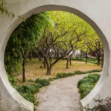 Moon Gate in the Garden of Pleasance (Yiyuan) in Suzhou, Jiangsu province, China, License Type: media, Download Time: 2026-09-01T19:13:49.000Z, User: LP_NZhan, Editorial: false, purchase_order: 65050 - Digital Destinations and Articles, job: App Content, client: Lonely Planet App, other: Nadine Zhan