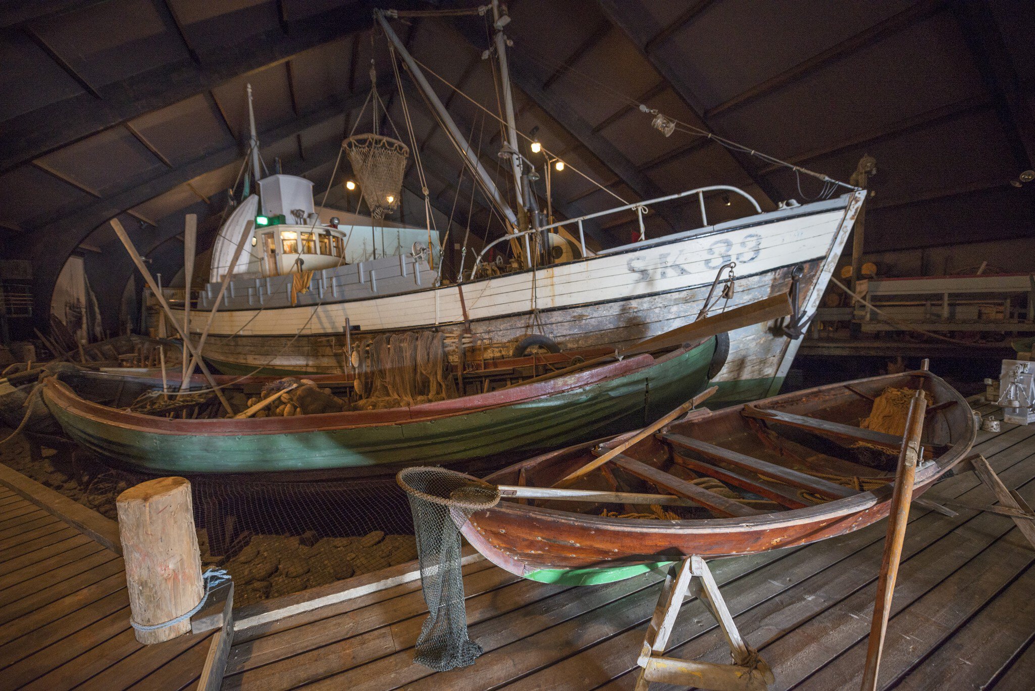 SIGLUFJORDUR, ICELAND - JUNE 14, 2016: Indoor display of herring Era Museum. Exhibition in the Boathouse provides impression of typical North Iceland herring Port.  License Type: media  Download Time: 2023-11-07T19:51:02.000Z  User: fabricencoredesign31  Is Editorial: Yes  purchase_order:   