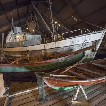 SIGLUFJORDUR, ICELAND - JUNE 14, 2016: Indoor display of herring Era Museum. Exhibition in the Boathouse provides impression of typical North Iceland herring Port.  License Type: media  Download Time: 2023-11-07T19:51:02.000Z  User: fabricencoredesign31  Is Editorial: Yes  purchase_order:   