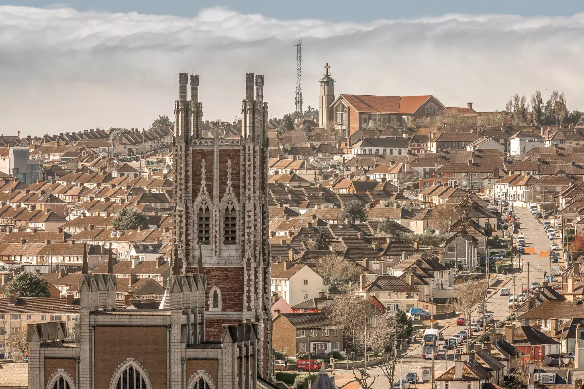 A view of the church towers and house roofs of Cork City, Ireland. mikemike10/Shutterstock