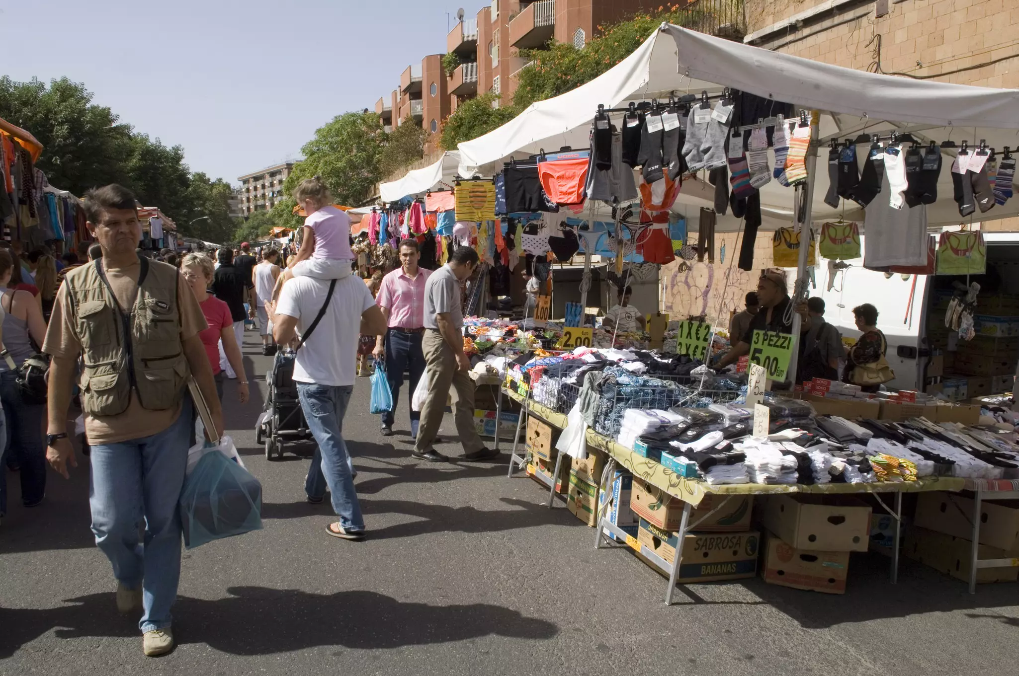 Porta Portese market, Trastevere and Testaccio.