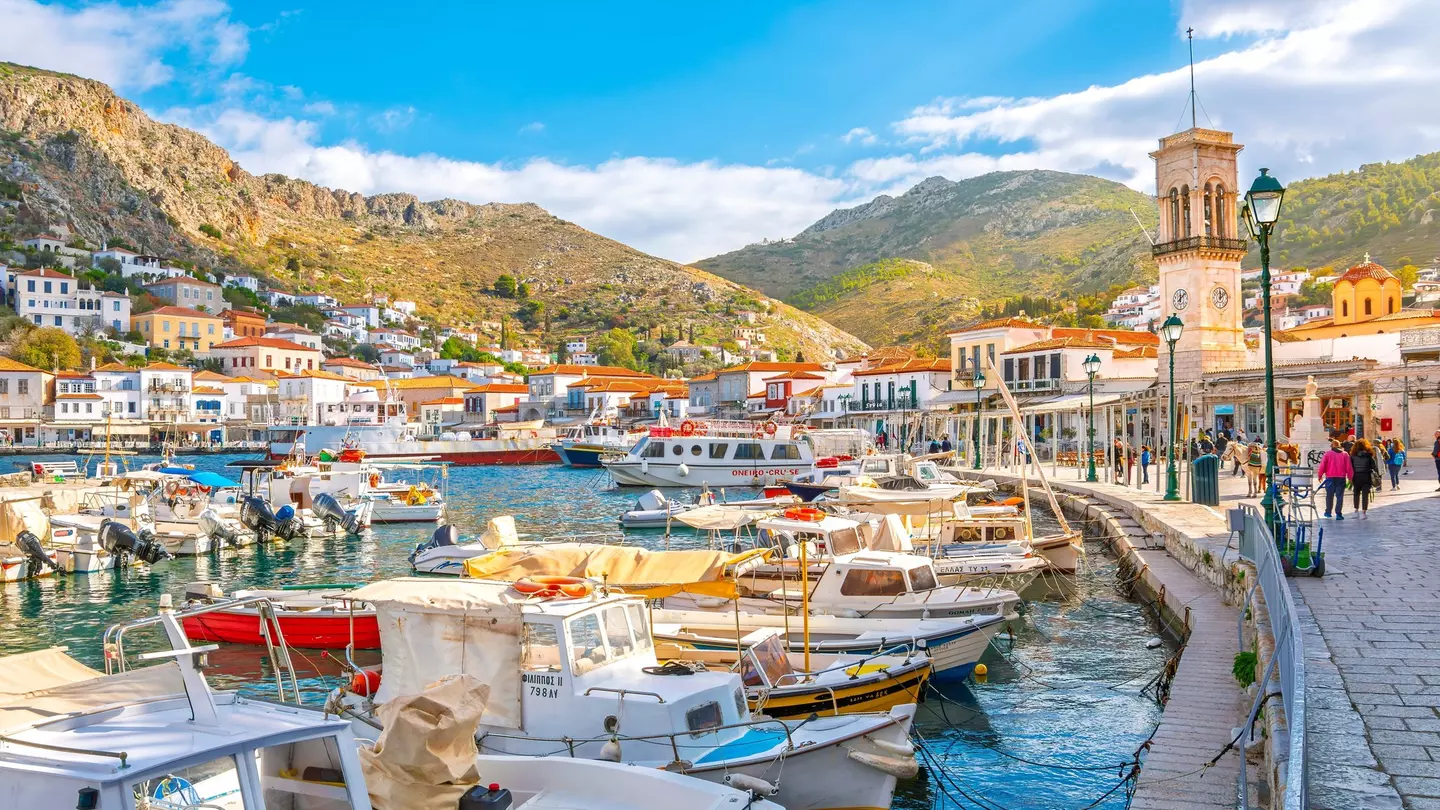 View of boats in the harbor and port of the Greek waterfront village of Hydra.