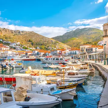 View of boats in the harbor and port of the Greek waterfront village of Hydra.