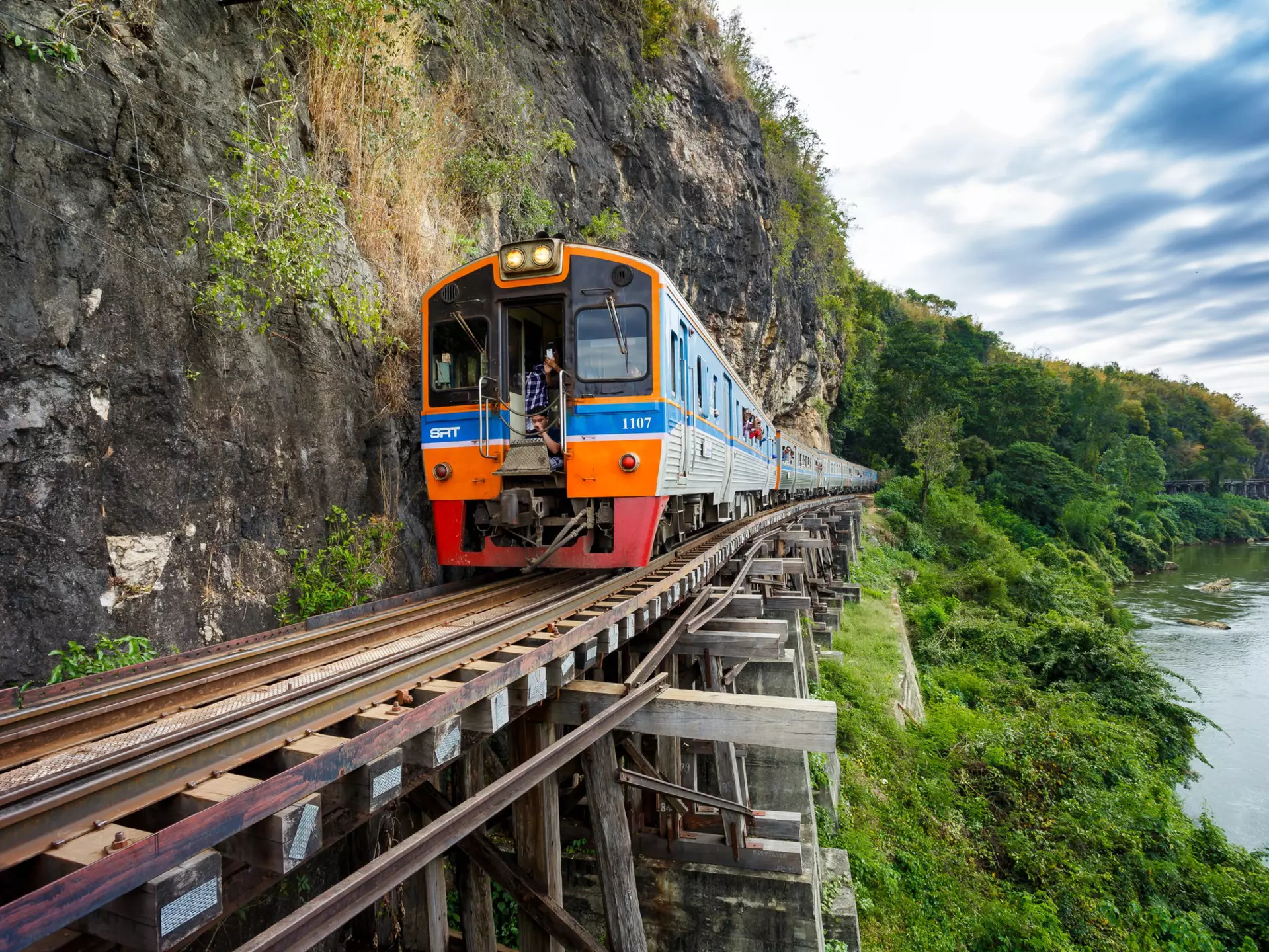 A train on the ”Death Railway“ near Kanchanaburi, Thailand. banjongseal324SS/Shutterstock