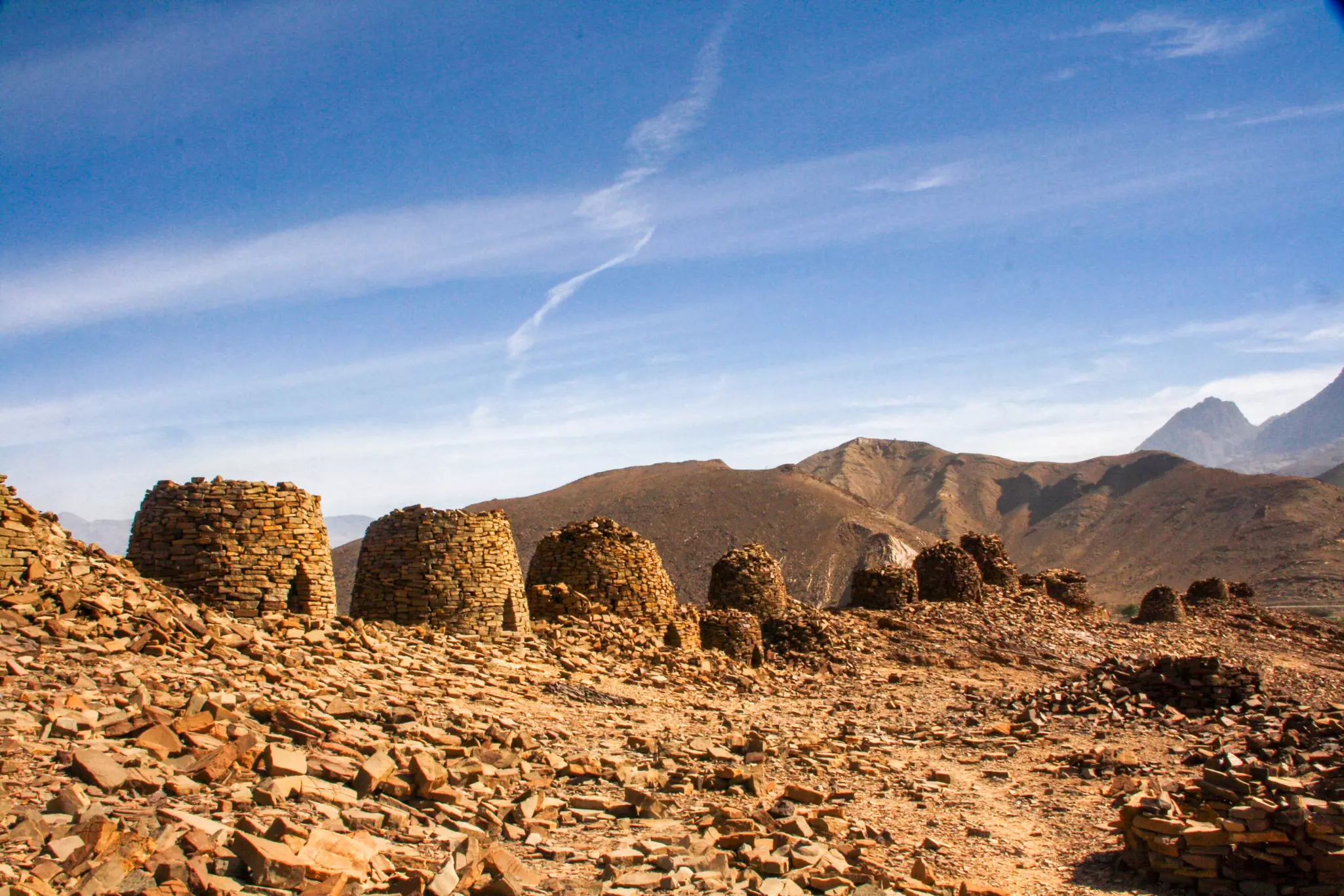 Stone beehive-shaped tombs in Oman.