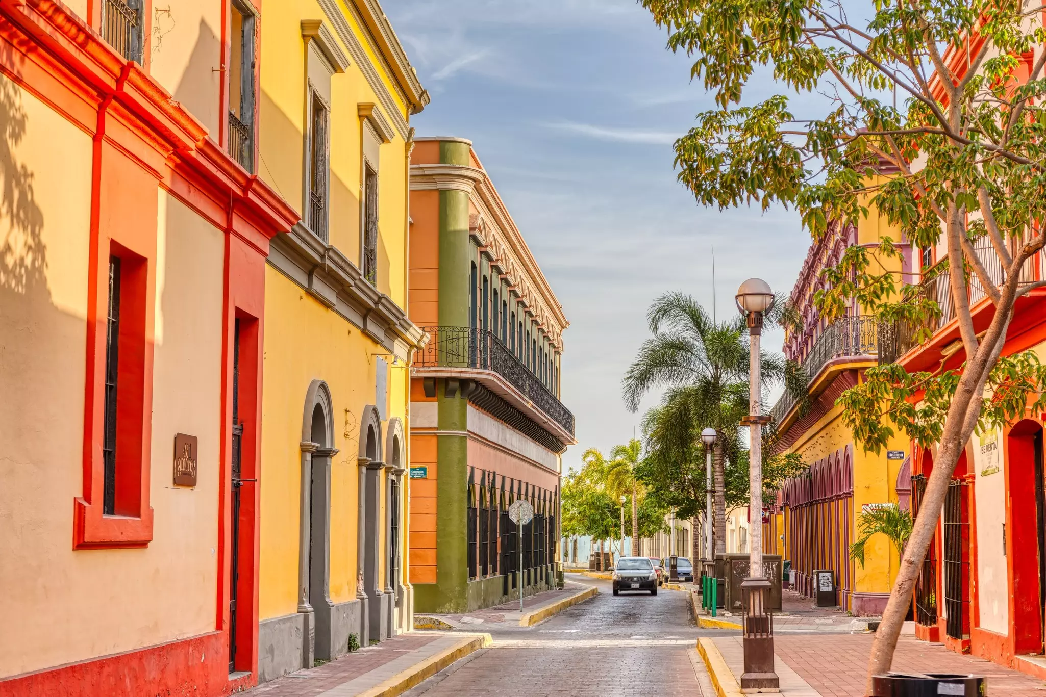 Pastel-colored buildings in a city's historic center.