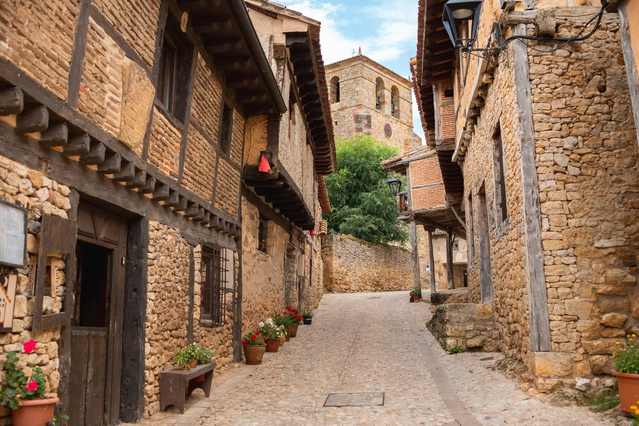 A cobblestone street in a medieval village.