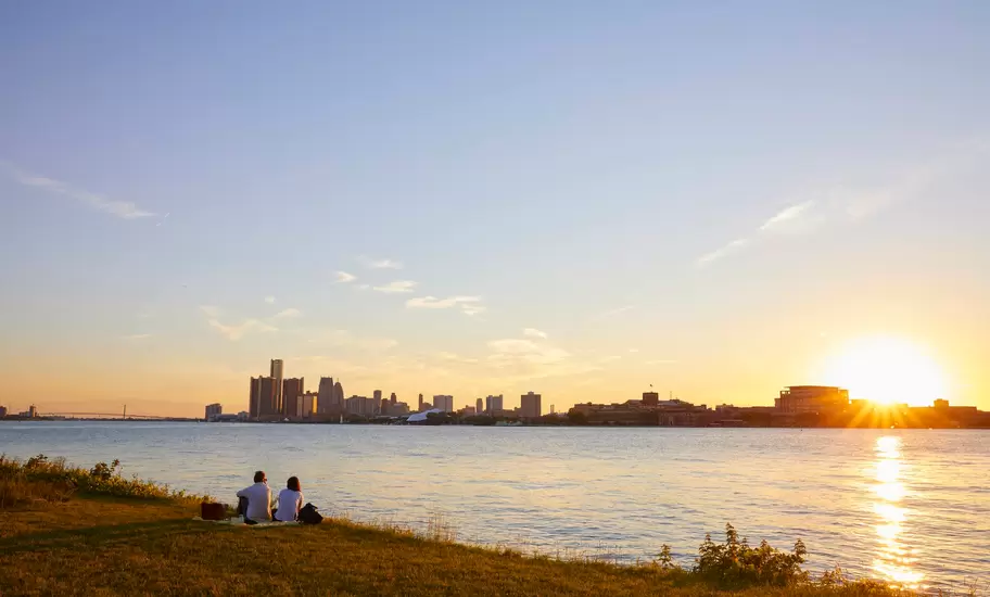 Sunset over Detroit as seen from Belle Isle in the Detroit River.