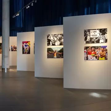 Wide interior view of a photo exhibition gallery at the House of the History of the Federal Republic of Germany in Bonn, Germany. 