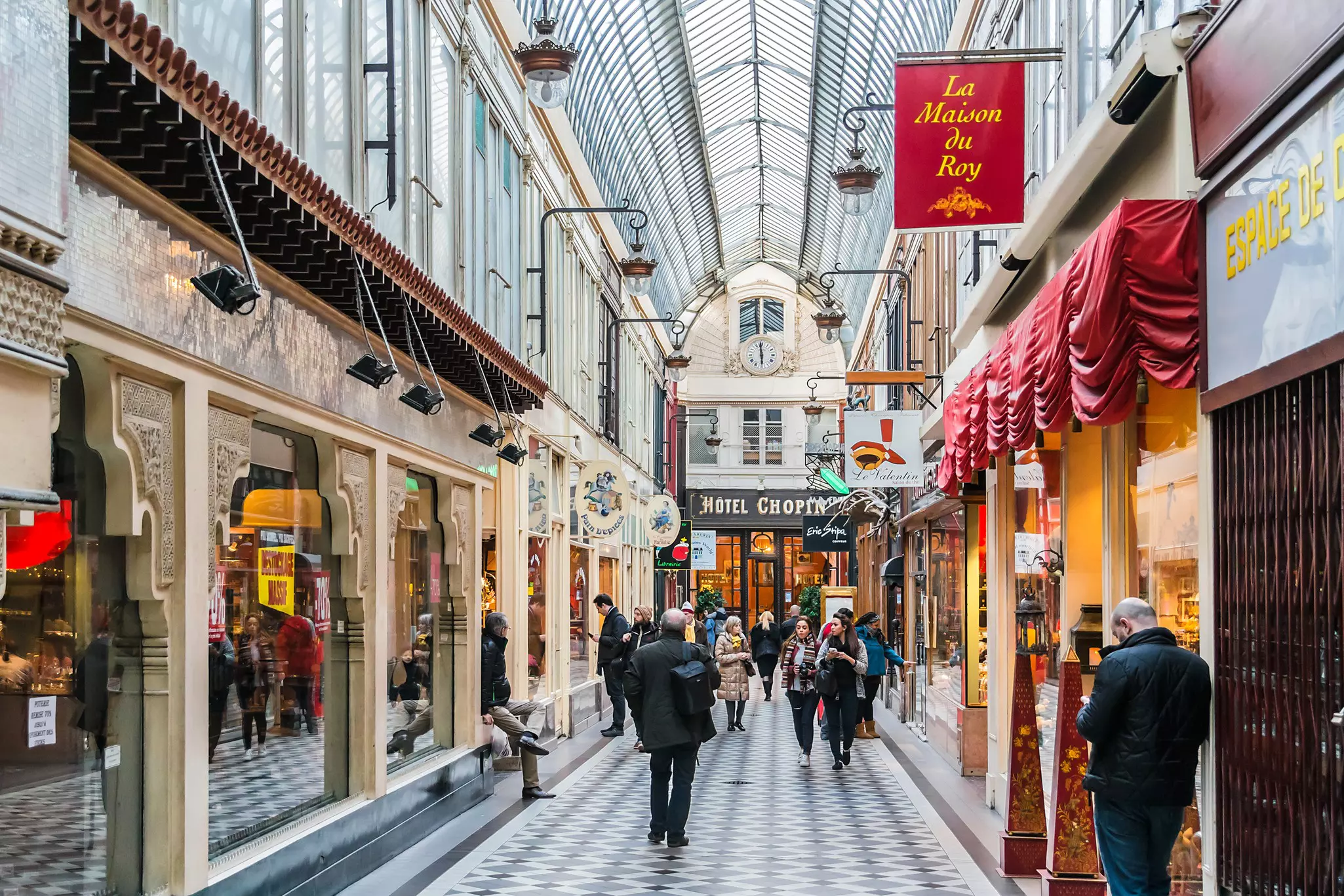 Interior of Passage Jouffroy (1846). Jouffroy Passage in Paris - one of most charming covered arcades with a lot of jewelers shops, confectionery, boutiques and shops.