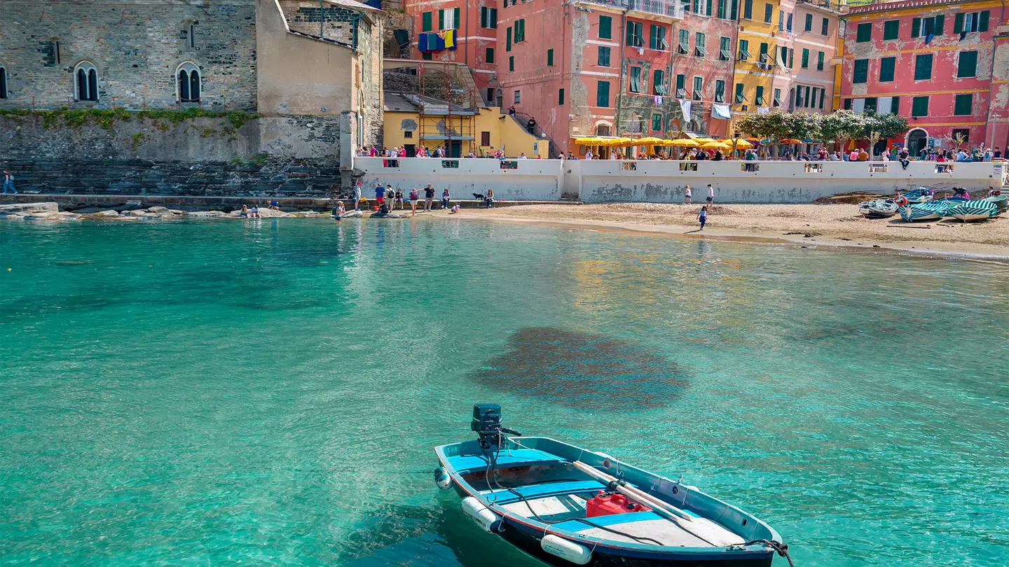 Boat in the harbour of picturesque village of Vernazza, Cinque Terre, Italy