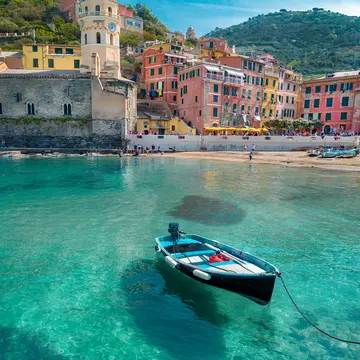 Boat in the harbour of picturesque village of Vernazza, Cinque Terre, Italy
