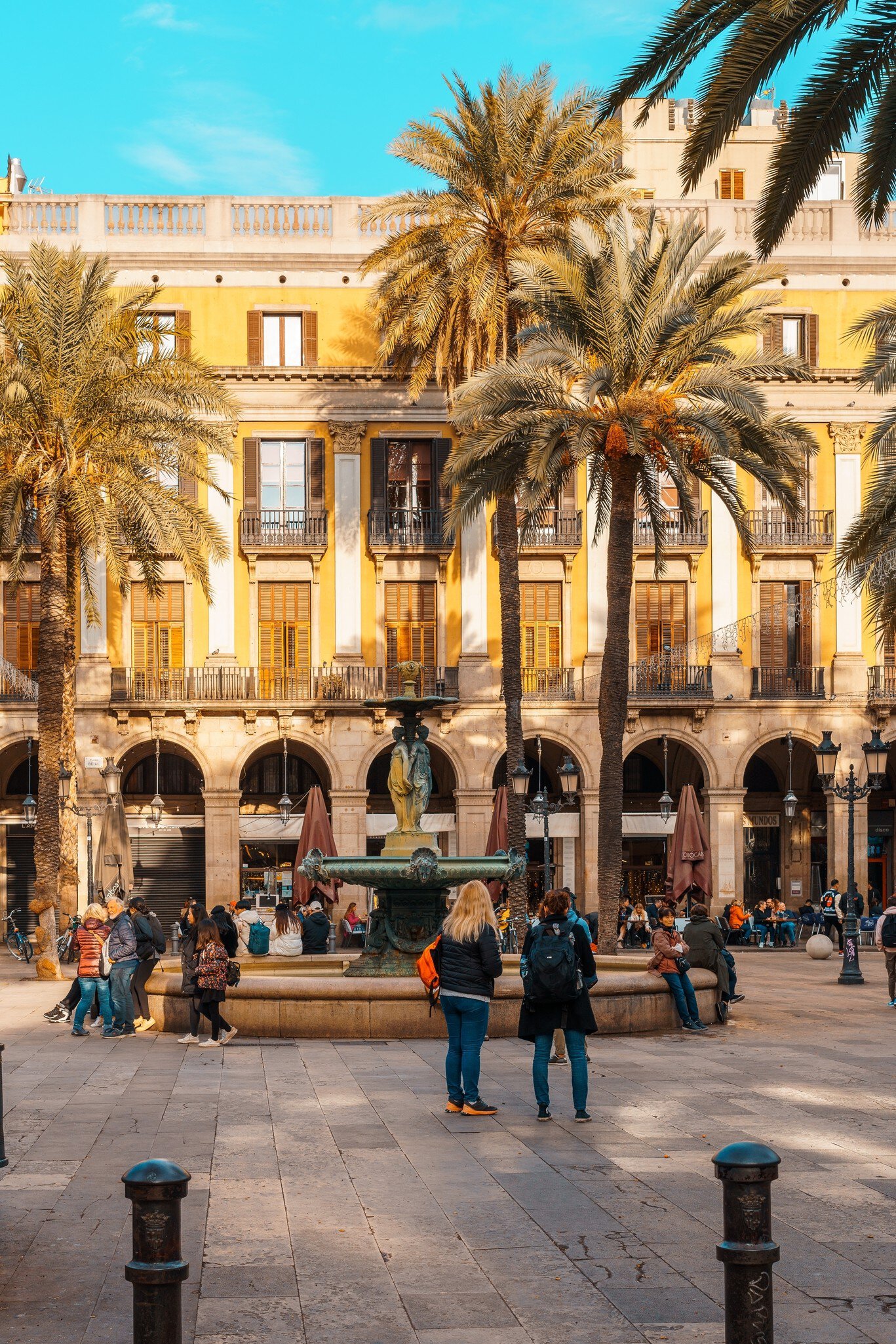 Plaça Reial is a square in Barcelona's Gothic Quarter and adjoins the Rambla. Manuel Milan/Shutterstock