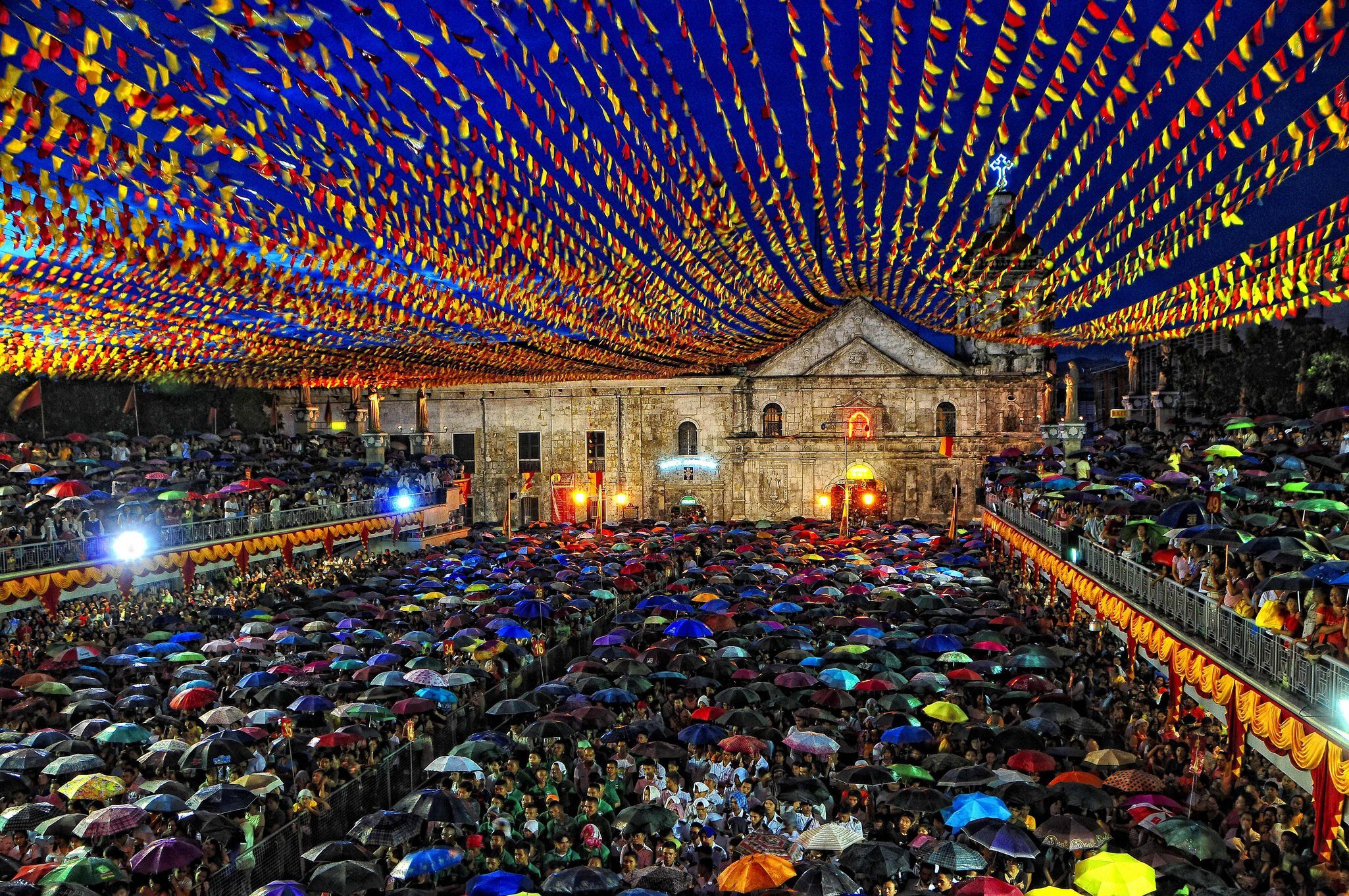 Pilgrims in town square at night for the coming Fiesta of Sr. Sto. Niño, at Basilica Minore Del Sto, Nino De Cebu, Cebu City.