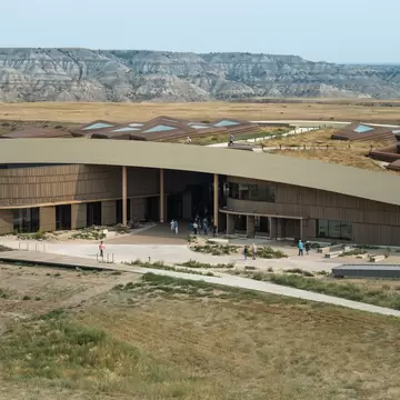 The landscape of the North Dakota badlands around the library. 