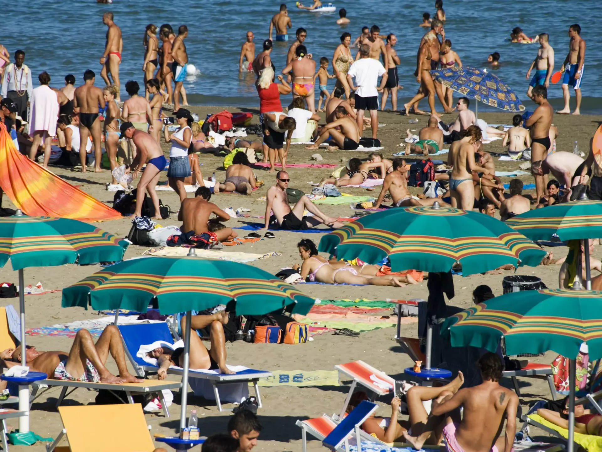 23835-69
Europe, Italy, Veneto, Venice, beach, clothing, coastal, crowd, culture, day, enjoy, female, front view, group of people, holiday, large group of people, leisure, lie, male, man, men, mixed age range, ocean, outdoors, people, rear view, relaxation, sand, sea, seascape, shadow, side view, swimwear, travel, walk, waterscape, woman, women
Summer crowds on Lido di Venezia.