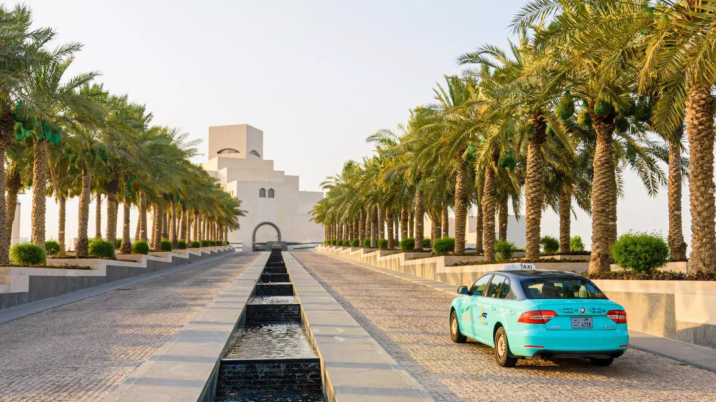 Karwa taxi approaching the Museum of Islamic Art, Doha, Qatar