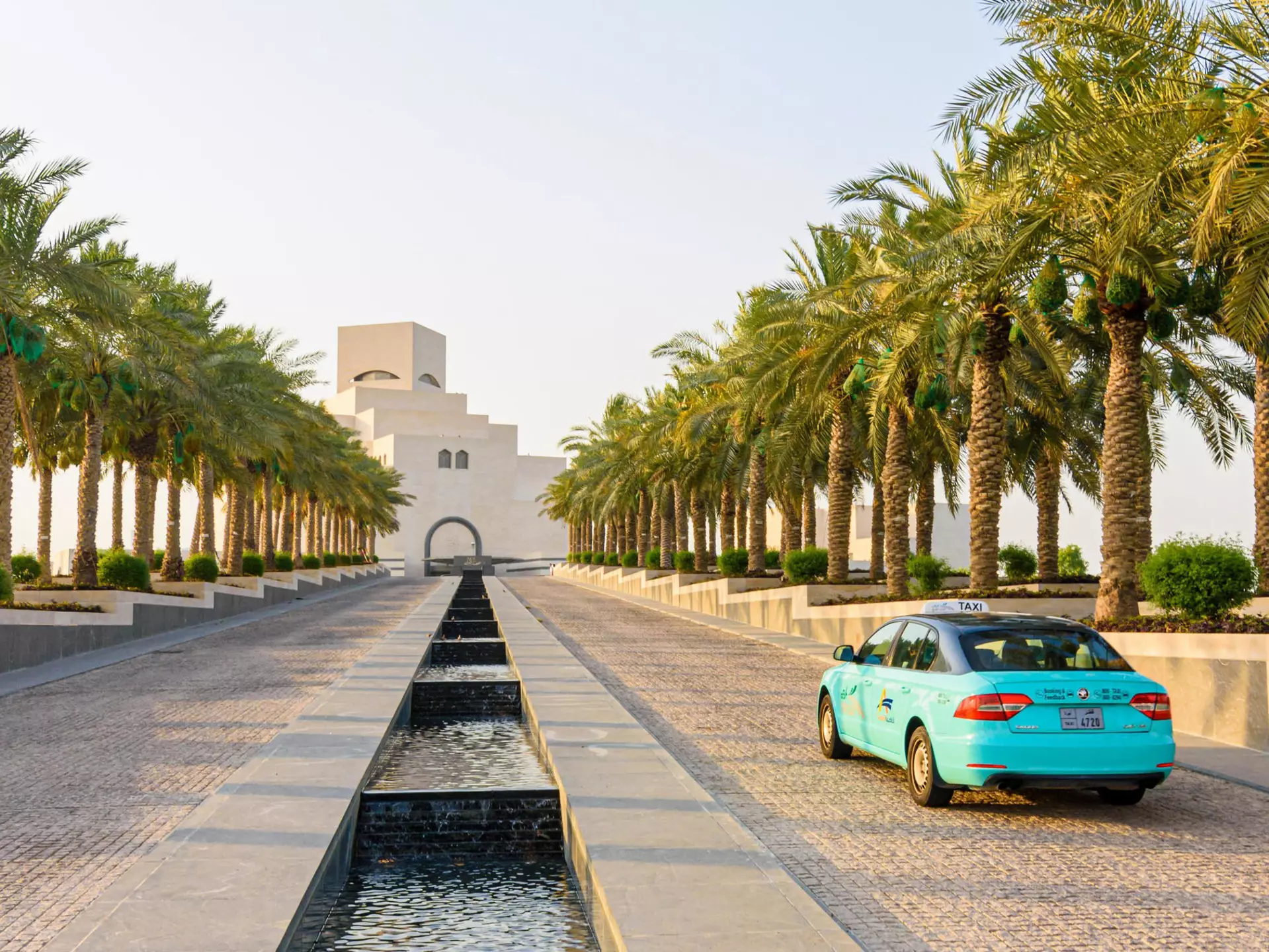 Karwa taxi approaching the Museum of Islamic Art, Doha, Qatar
