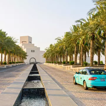 Karwa taxi approaching the Museum of Islamic Art, Doha, Qatar