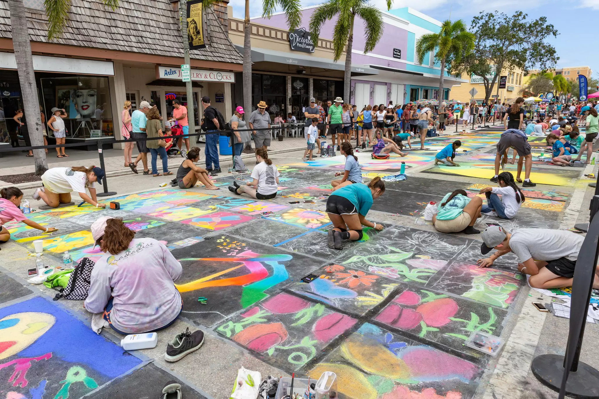 25Th Annual Street Painting Festival. Artist everywhere as far as the eye can see all working hard on painting art on the streets of Lake Worth