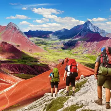 Rainbow mountains or Vinicunca Montana de Siete Colores with three tourists or hikers, Cuzco region in Peru, Peruvian Andes, License Type: media, Download Time: 2026-05-21T16:57:40.000Z, User: lonelyplanetmedia, Editorial: false, purchase_order: 65050 - Digital Destinations and Articles, job: Comp Ingestion, client: Global Publishing WIP, other: Pia Peterson