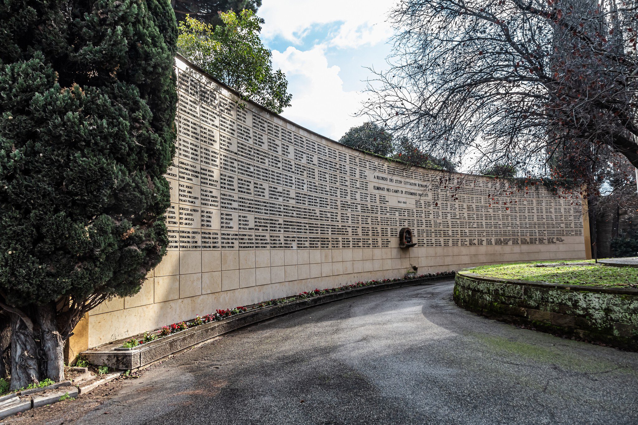 Rome, Italy - December 07, 2019:  Grave monument in Cemetary Campo Verano ( Cimitero Monumentale Al Verano ) near San Lorenzo in Rome, Italy
