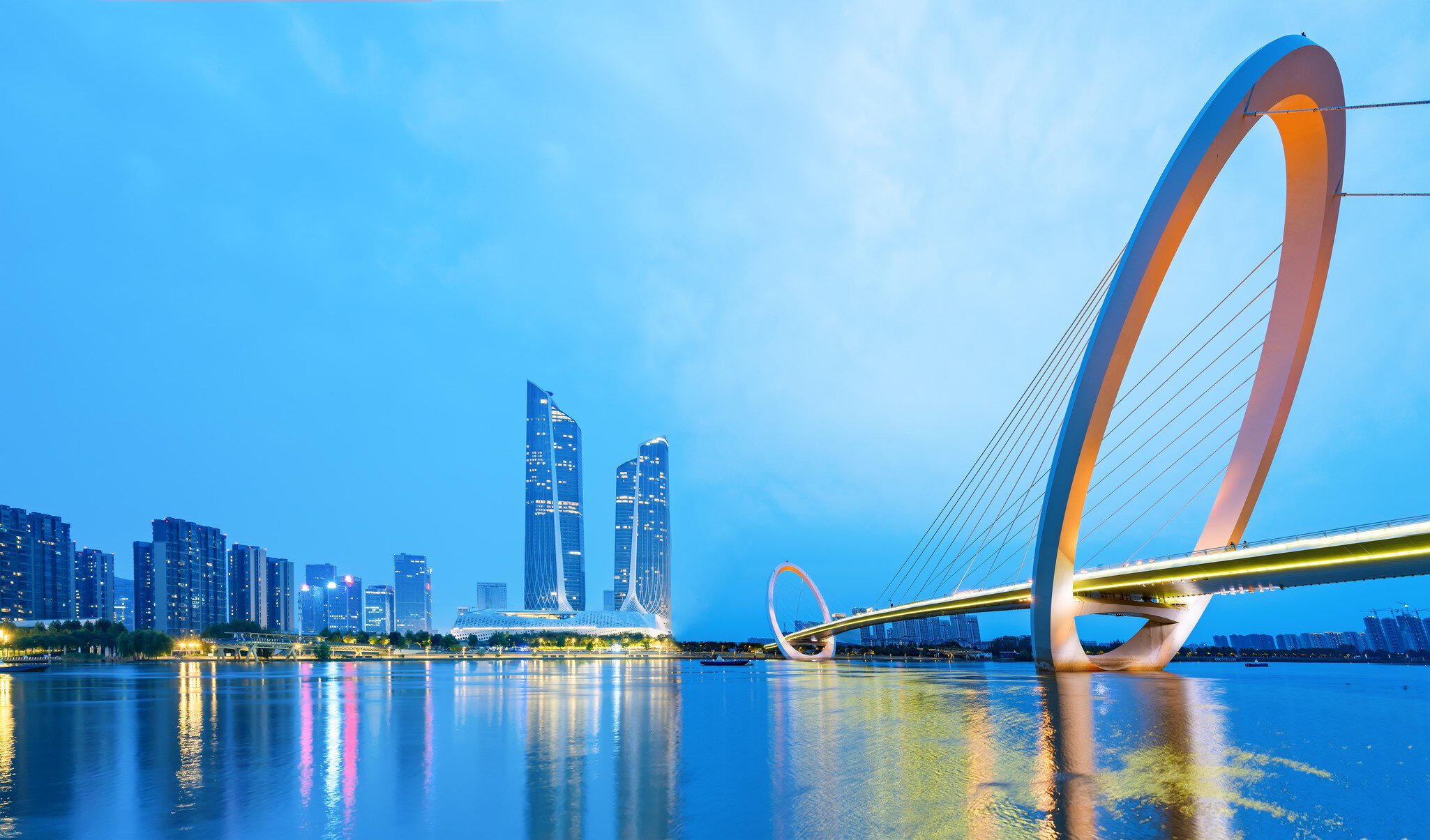 Eye of Nanjing Pedestrian Bridge and urban skyline in Jianye District, Nanjing, China  License Type: media  Download Time: 2021-02-19T01:34:22.000Z  User:   Is Editorial: No  purchase_order: