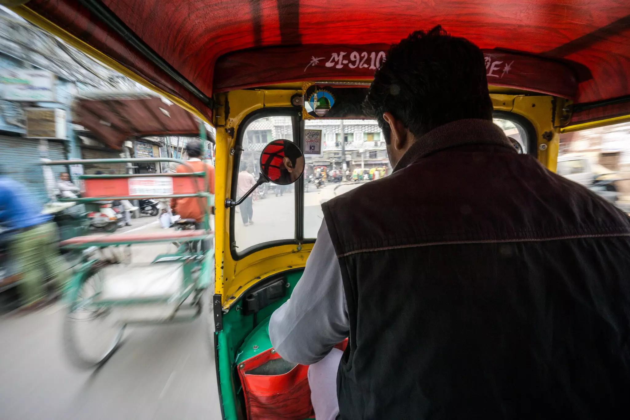 The view from an autorickshaw in Old Delhi, India.