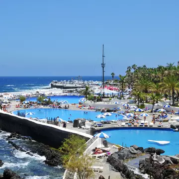 June 16, 201: Lago Martianez in Puerto de la Cruz.
80868469
amusement, canary, cesar, coast, colorful, complex, cruz, destination, europe, european, geology, heat, horizontal, hot, islands, lago, landmark, landscape, manrique, martianez, ocean, picturesque, pool, public, puerto, relax, resort, rock, rocky, scene, scenic, sea, seashore, seawater, shape, shore, spain, summer, swimming, tan, tenerife, tourism, tourist, town, travel, umbrella, vacations, view, village, volcanic