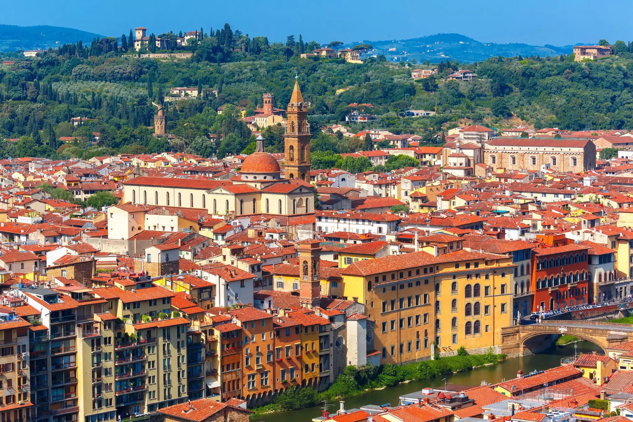 View of the Arno River, Giardino Torrigiani and more from Palazzo Vecchio in Florence. kavalenkava/Shutterstock