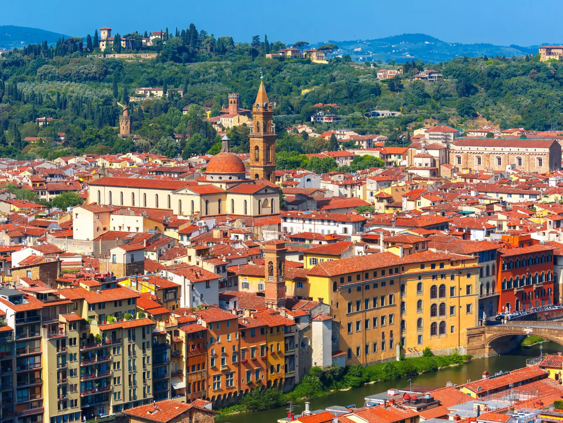 View of the Arno River, Giardino Torrigiani and more from Palazzo Vecchio in Florence. kavalenkava/Shutterstock
