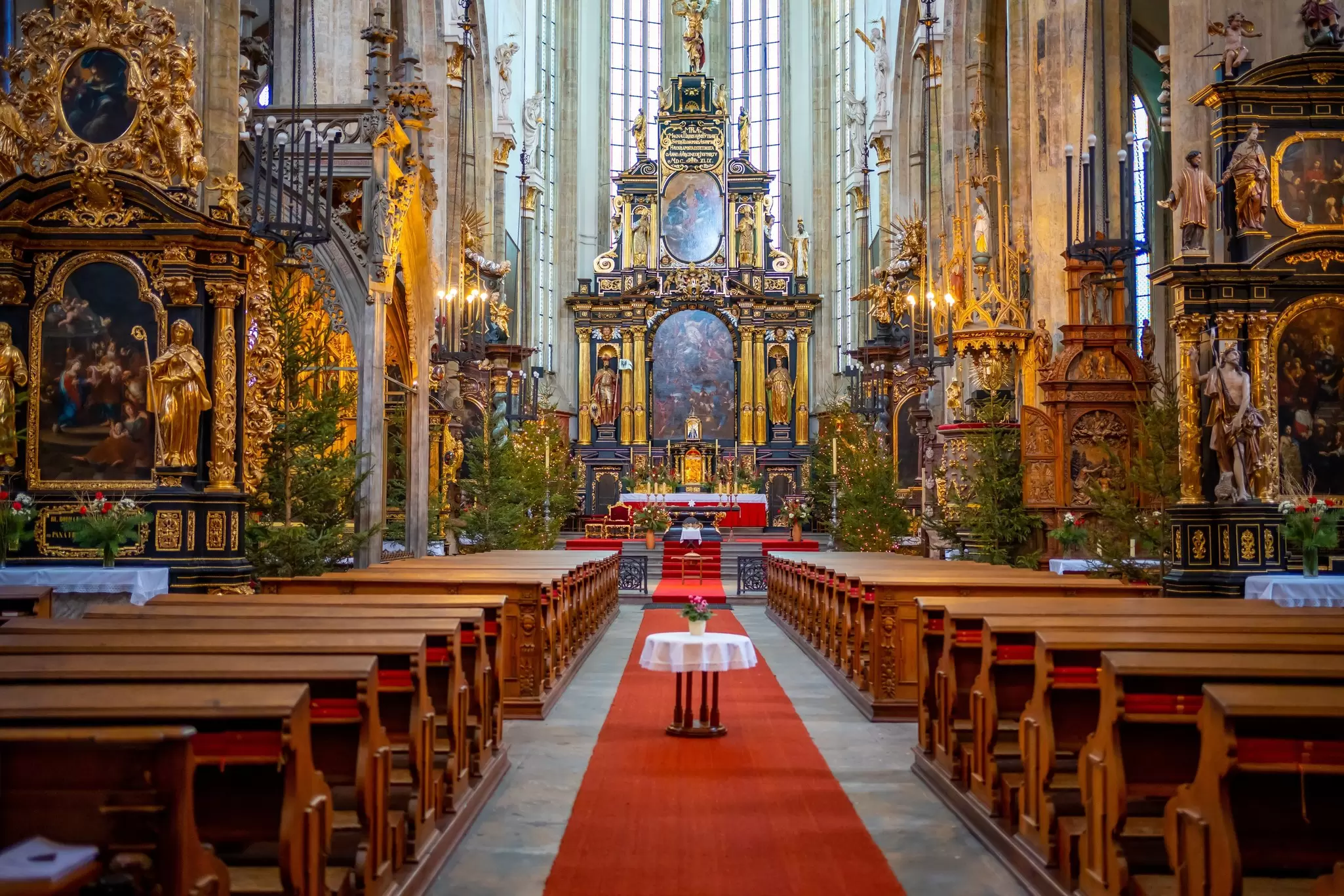 View down the nave of the altar of the Church of Our Lady Before Týn in Old Town Square, Prague, Czechia.