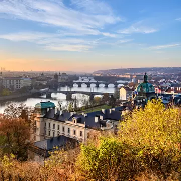 Prague Bridges over Vltava River in sunny autumn morning. View from Letna Gardens, Prague, Czech Republic.