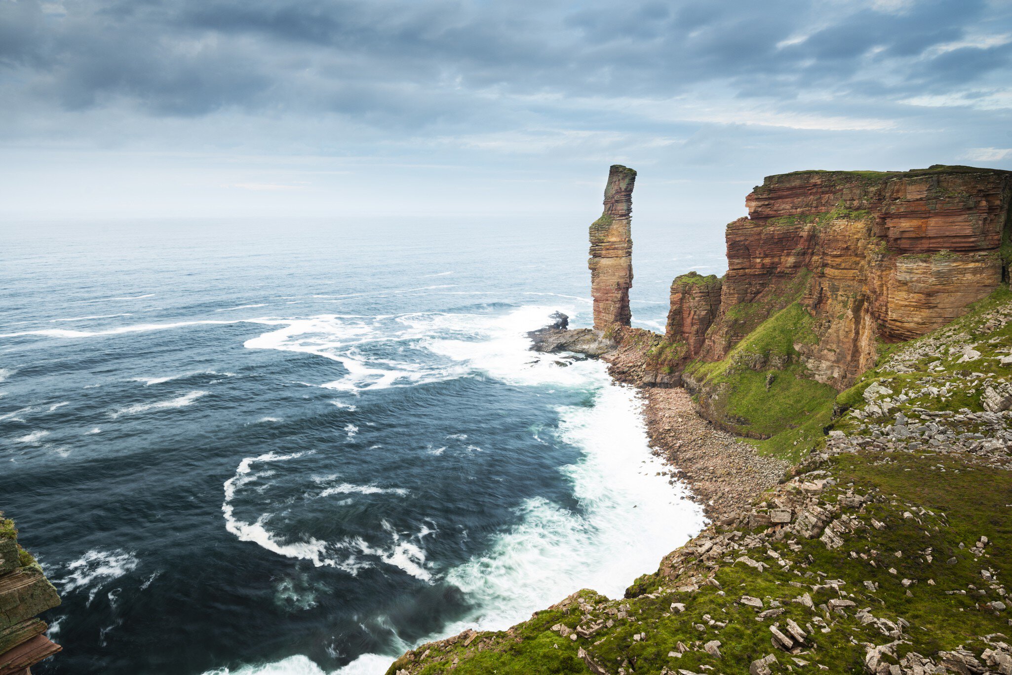 The Old Man of Hoy rock formation on the west coast of Mainland, Orkney, Scotland.