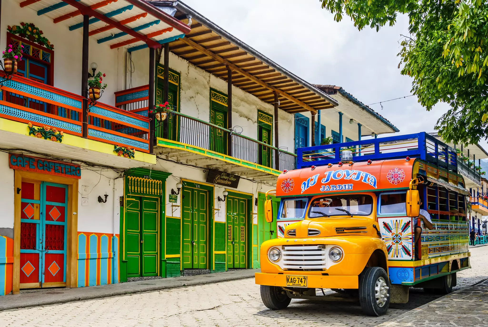 Colombia's colorful chivas and colectivos are great for shorter journeys in rural areas © streetflash / Shutterstock