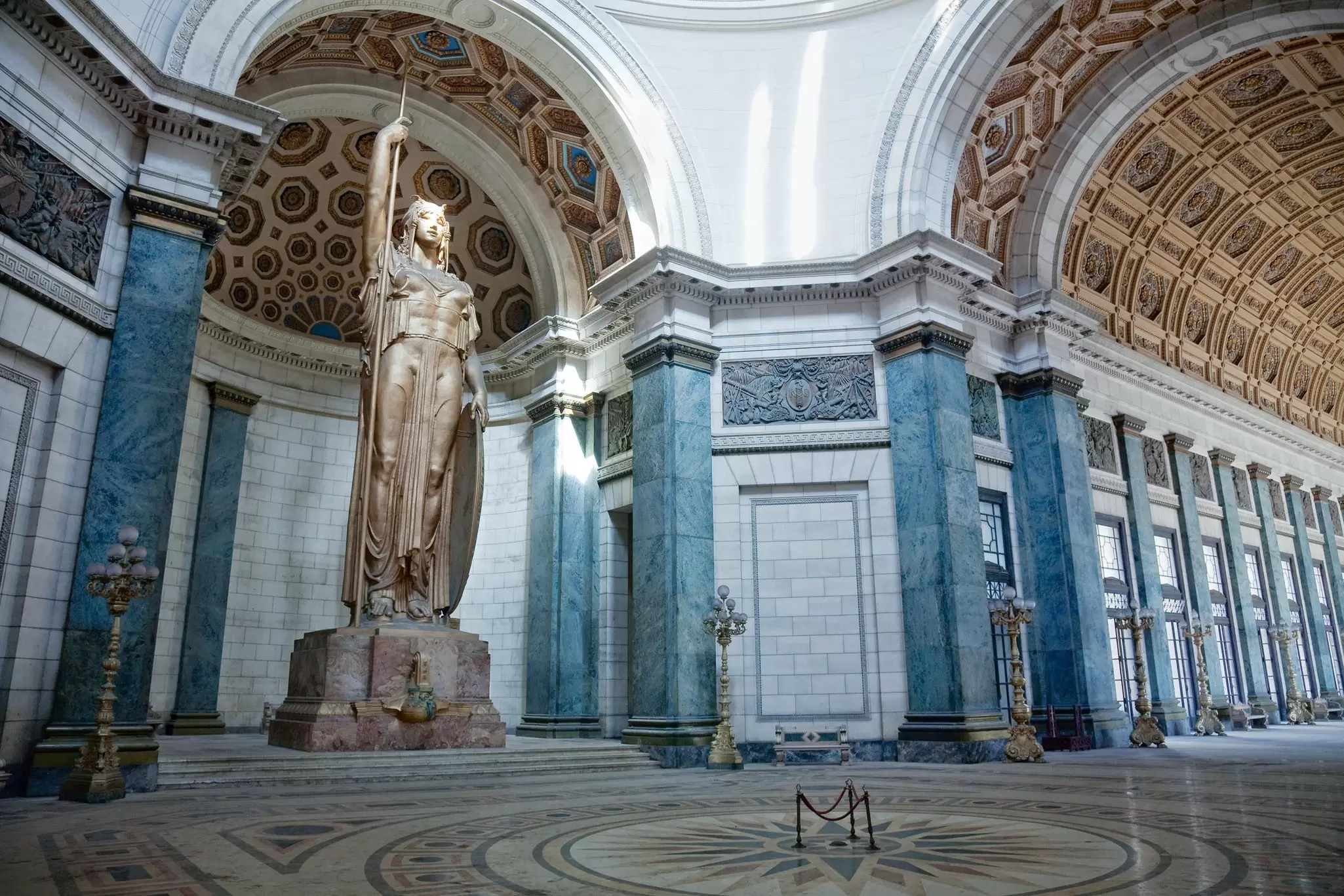 Bronze statue of a woman inside the entrance hall of the Capitol Building (El Capitolio) in Havana.