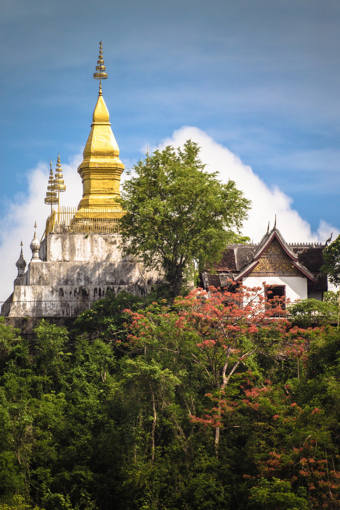 Luang Prabang, Laos, Southeast Asia: Landscape view over the city in the sunset lights from Mount Phousi, a sacred mountain located in the heart of the former capital of Laos