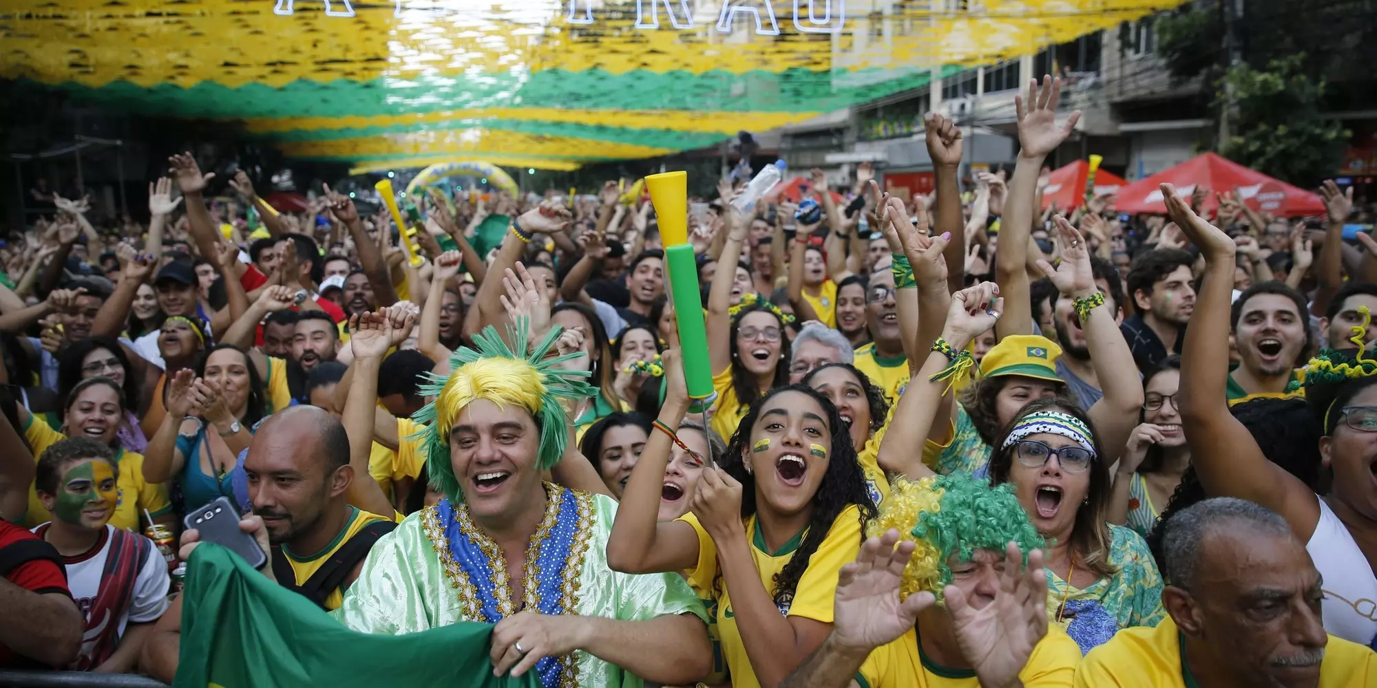 Brazilian fans gather at street party to support national soccer team playing Fifa World Cup - Rio de Janeiro, Brazil 06.27.2018
