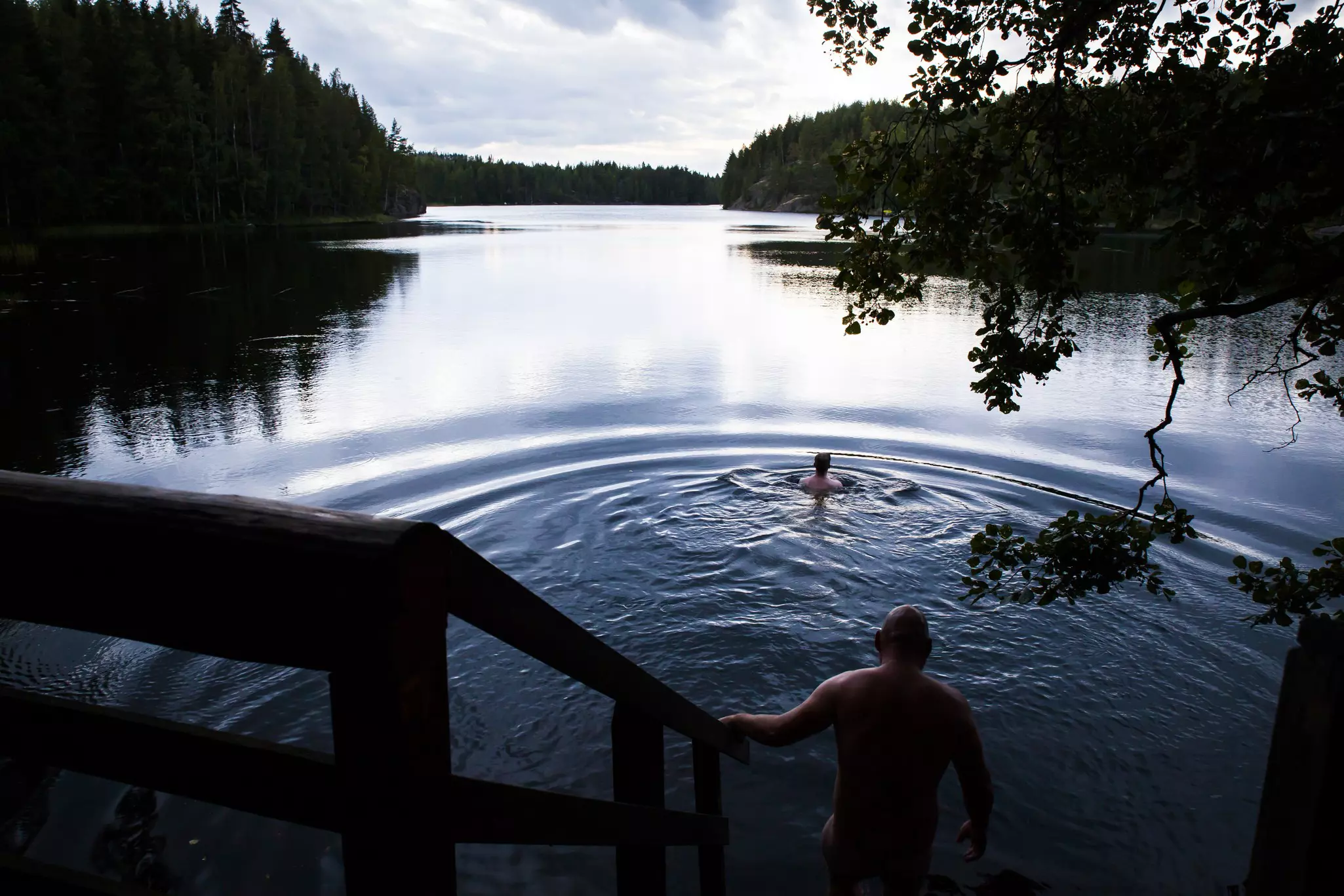 Bathing in Lake Saimaa after a sauna..