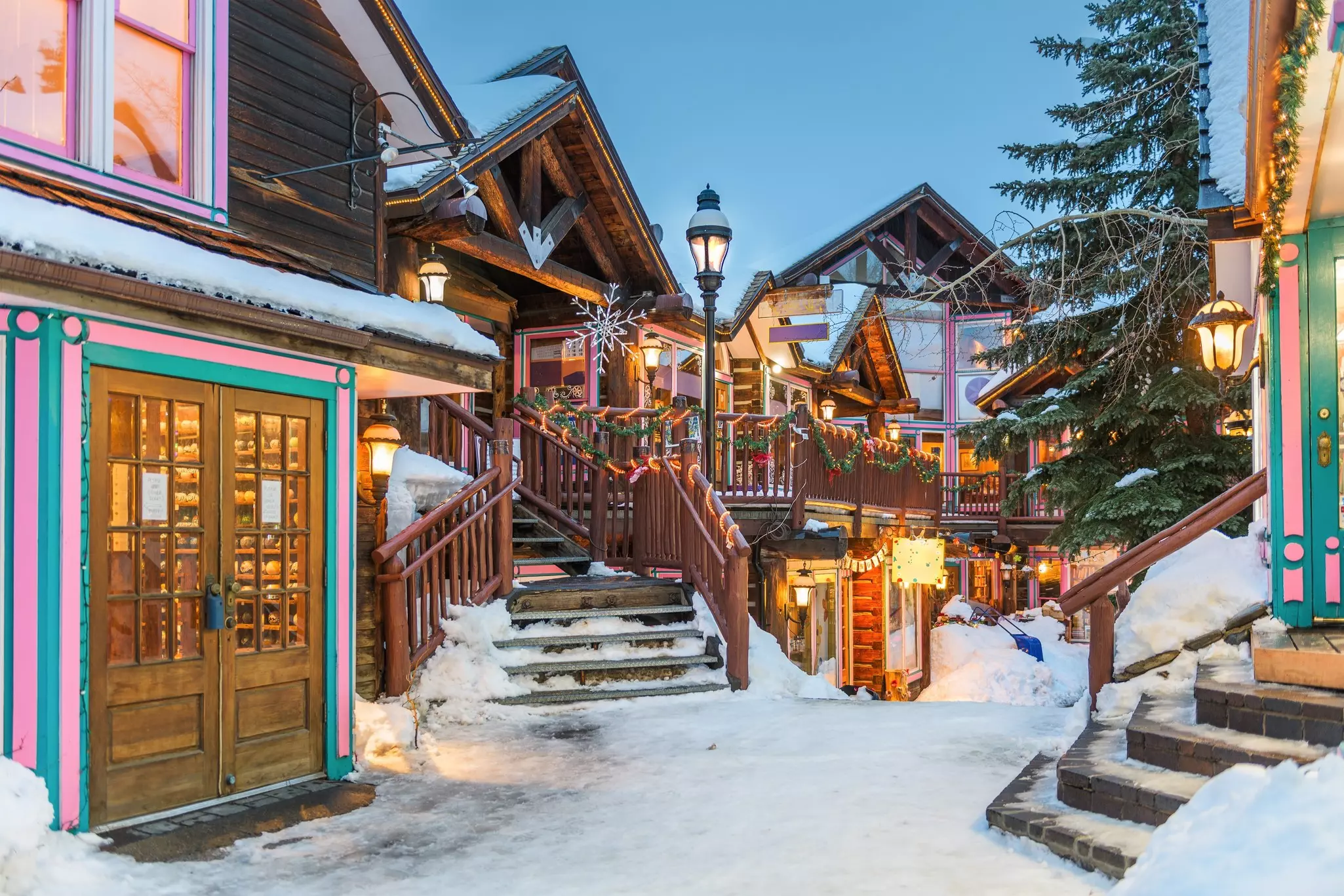 Breckenridge, Colorado, USA downtown streets at night in the winter with holiday lighting