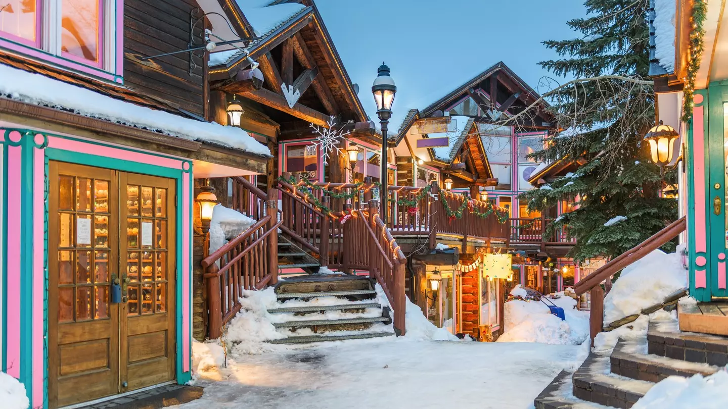 Breckenridge, Colorado, USA downtown streets at night in the winter with holiday lighting