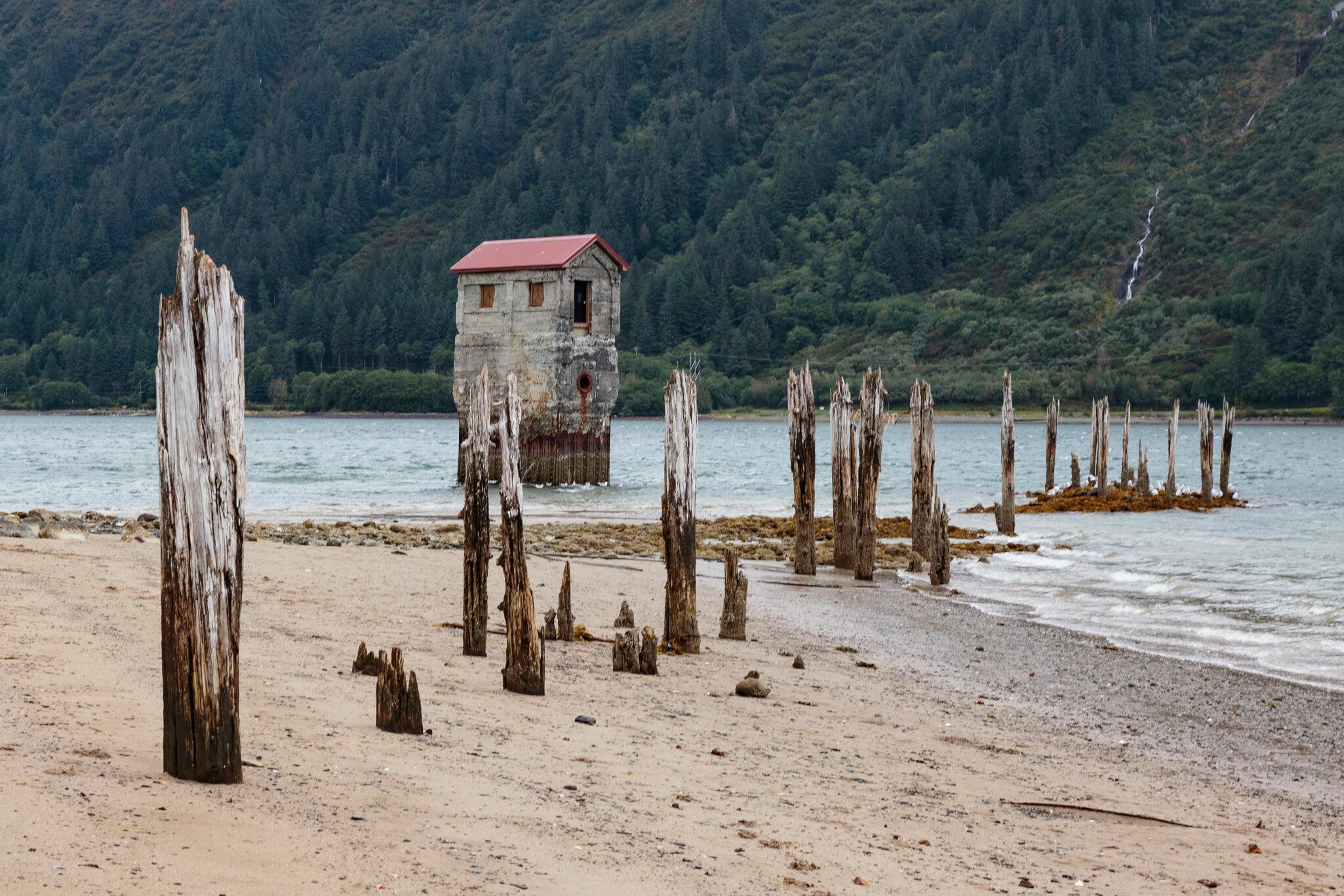September 08 2018 Juneau Alaska. Old pump station on sandy Beach.  in the Treadwell mine historic park in Juneau Alaska