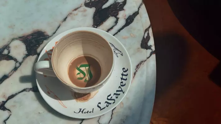 Empty coffee cup on a marble table.