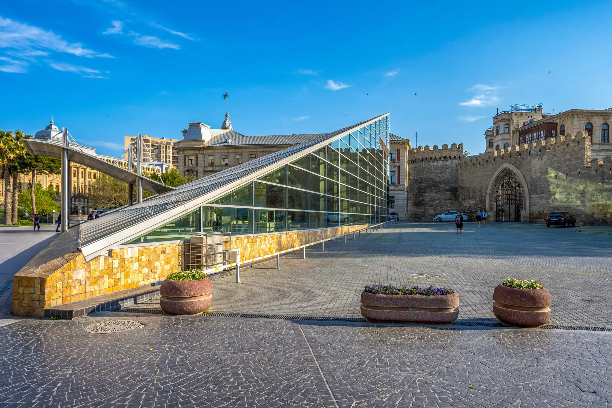 Pyramidal glass Building of "Icharishahar" subway entrance.