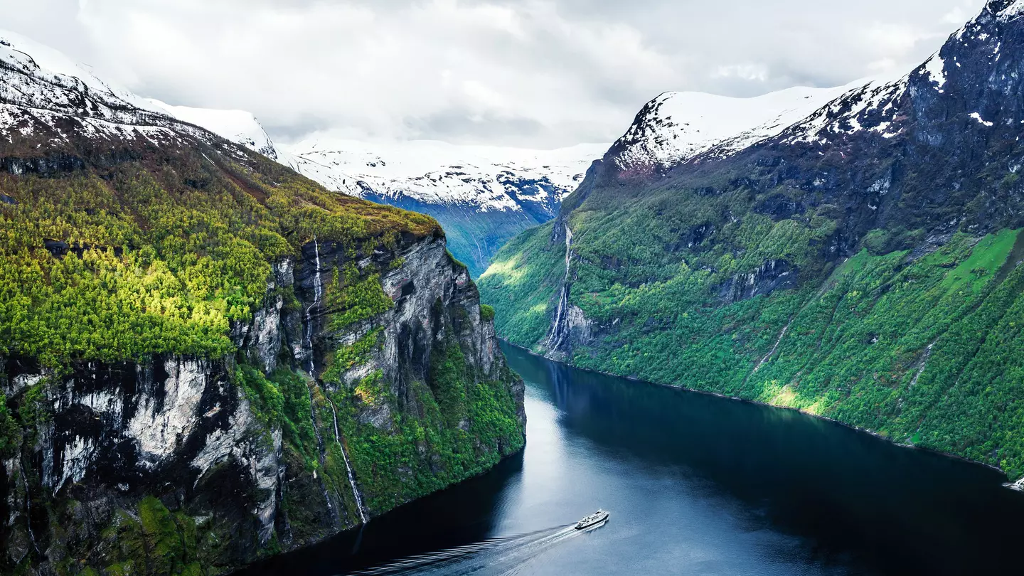 Take in the spectacular scenery on a ferry through Geirangerfjord © Marco Wong / Getty Images